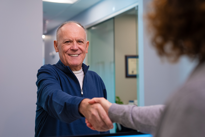 staff member greeting patient